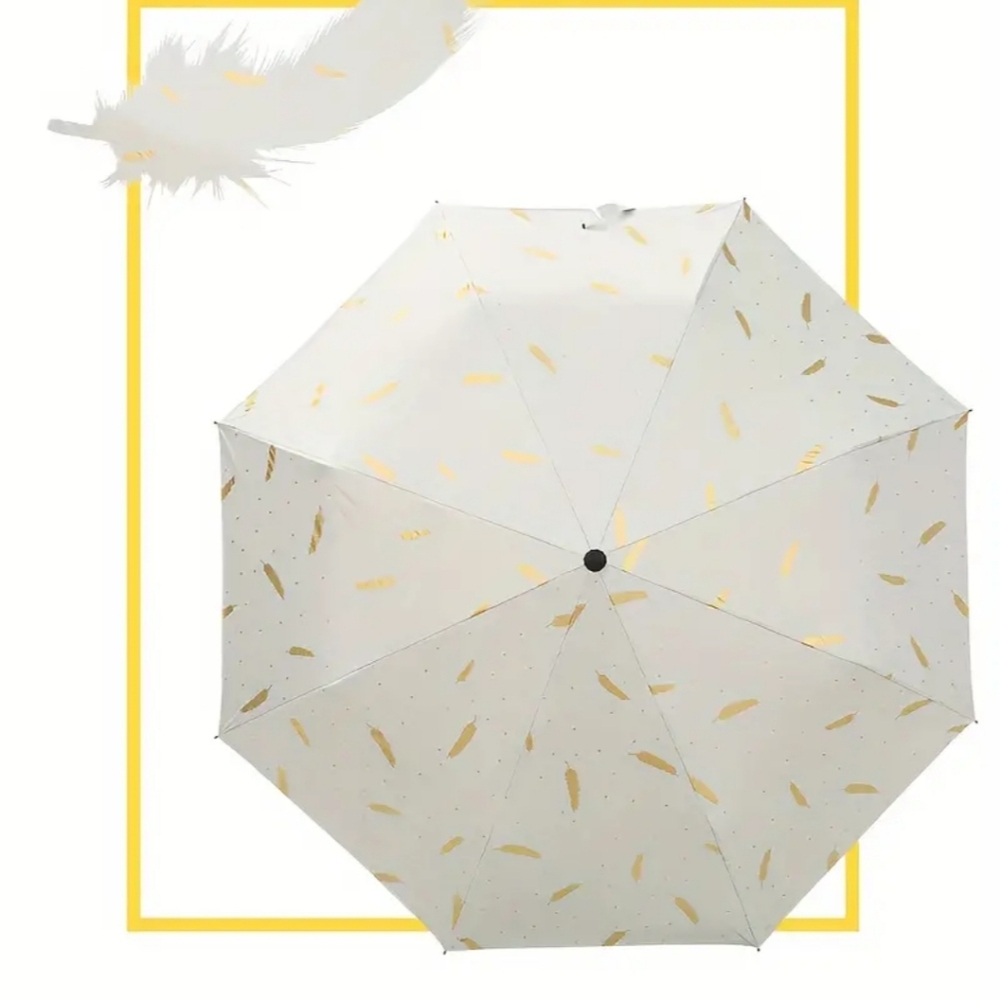 White gold feather compact umbrella with case. Last 1.   Also 1 Blk Camilla New